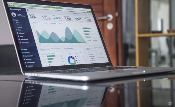 Analytics being viewed on laptop by tool in HR tech stack